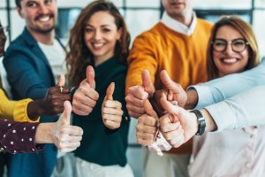 Team with thumbs up