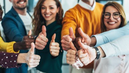 Team with thumbs up